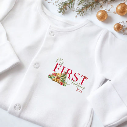 Baby's First Christmas Onesie & Vest Set featuring festive print and soft cotton fabric.