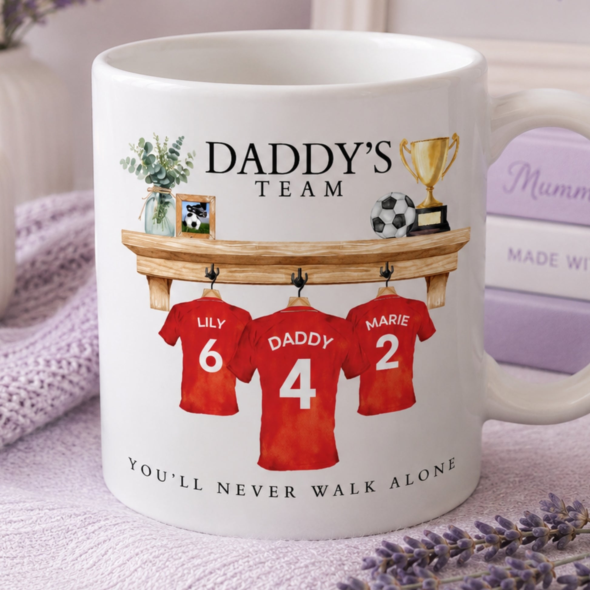 Personalised Football Lover Gift Mug featuring custom jerseys and a trophy to celebrate family and football.